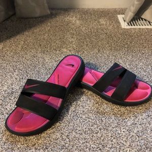 Women’s Nike slides. Black with hot pink swoosh and memory foam sole.